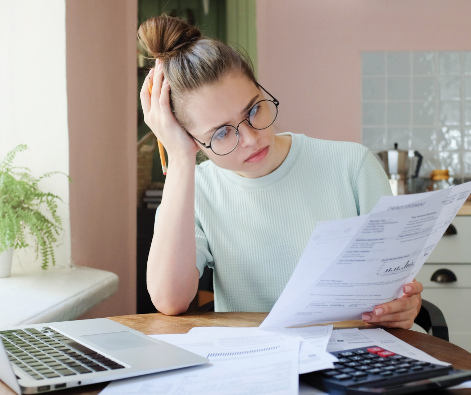 woman holding tax forms